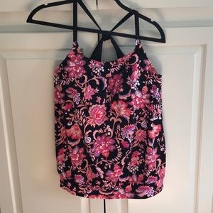 Two piece bathing suit. Never worn! Tankini style. Pinks and black.